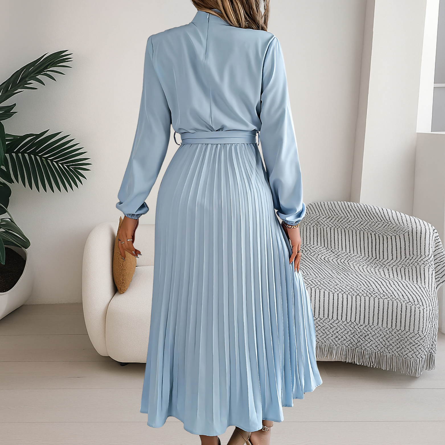 Dames midi jurk met plissé rok en strikceintuur