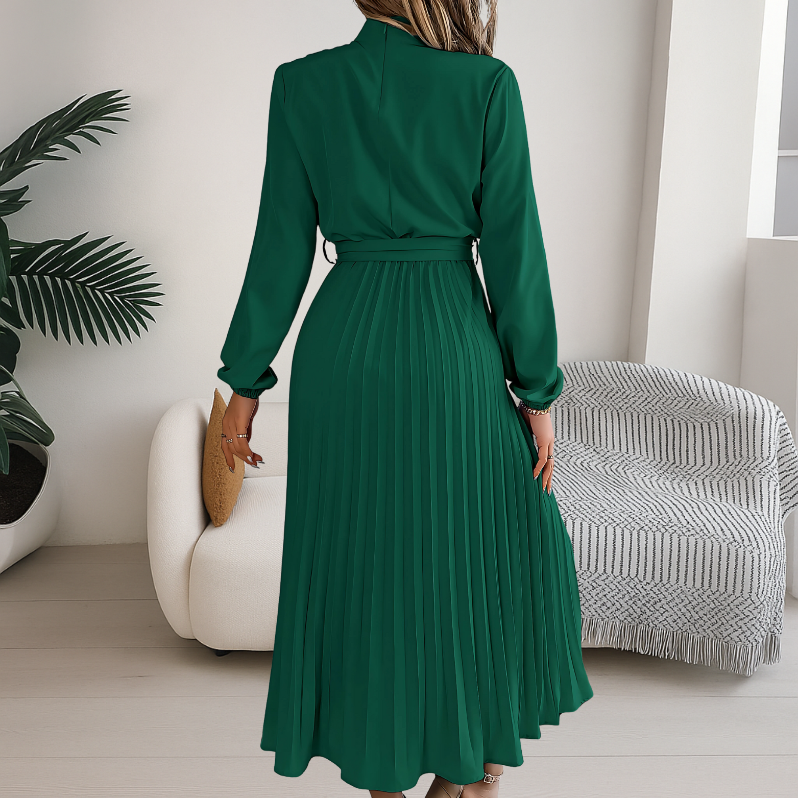 Dames midi jurk met plissé rok en strikceintuur