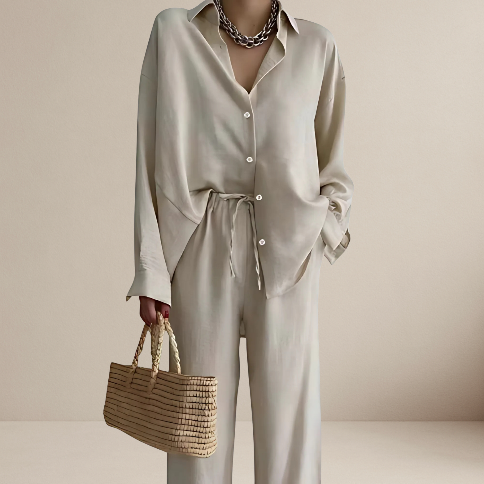 Tweedelige dames set met blouse en broek