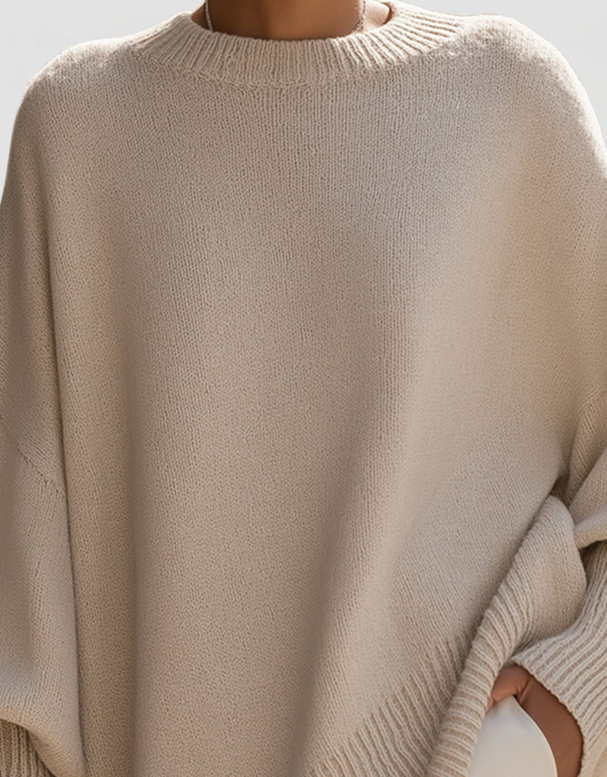 Dames Oversized Gebreide Trui met Asymmetrische Zoom en Ronde Hals