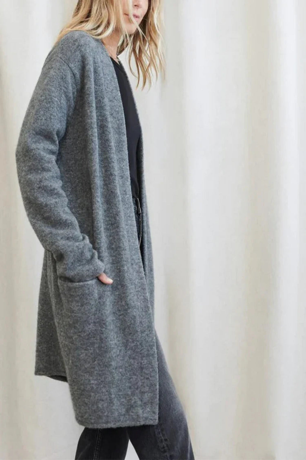 Dames lang gebreid vest met zakken