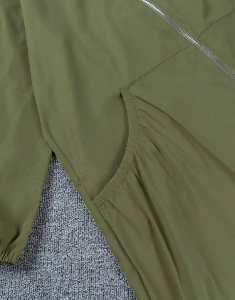 Regenjas met ritssluiting, capuchon en zijzakken voor dames