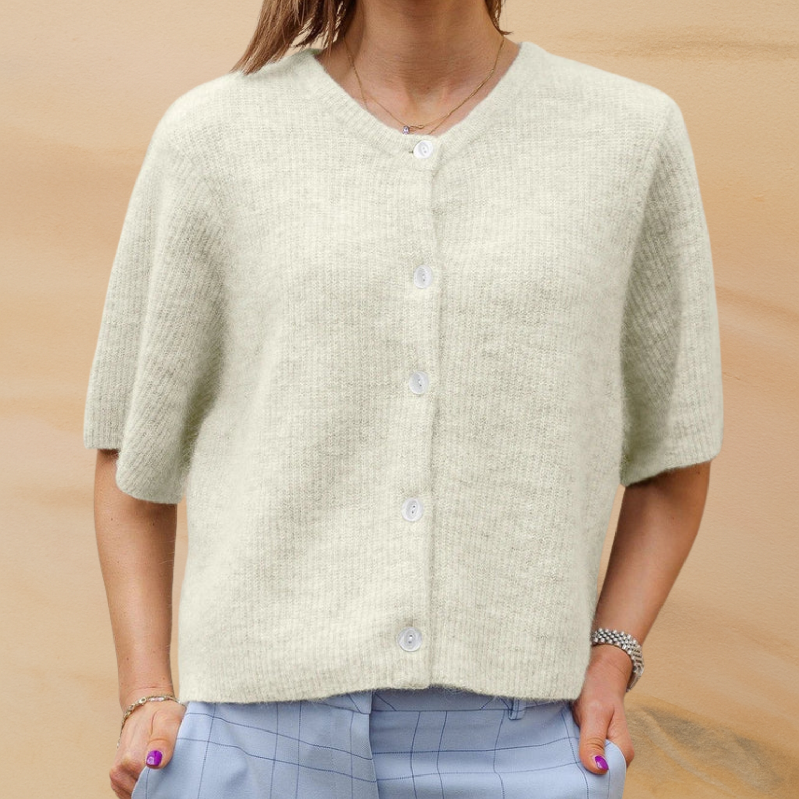 Damesvest met korte mouwen en knoopsluiting
