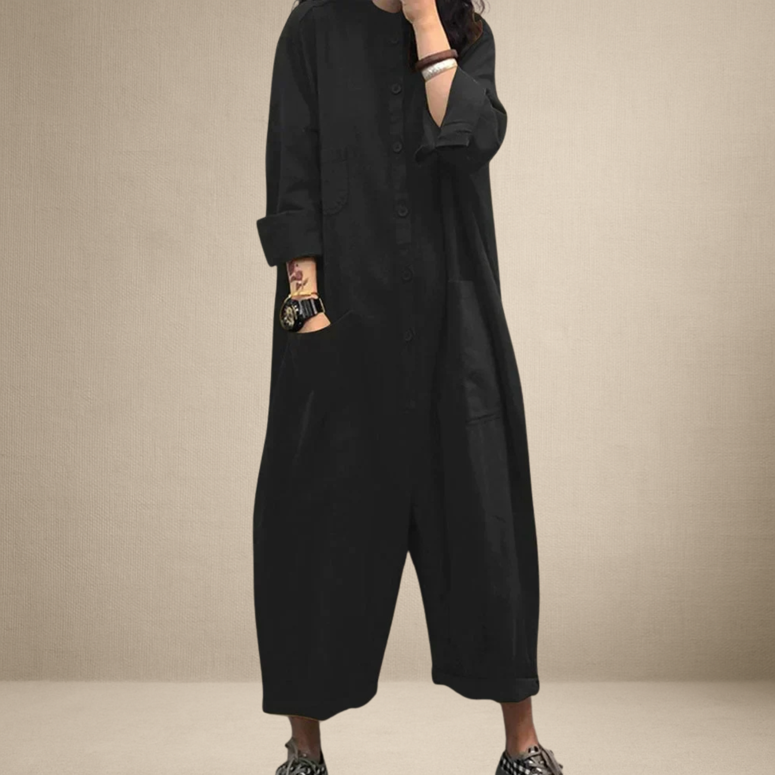 Dames jumpsuit met lange mouwen en knoopsluiting
