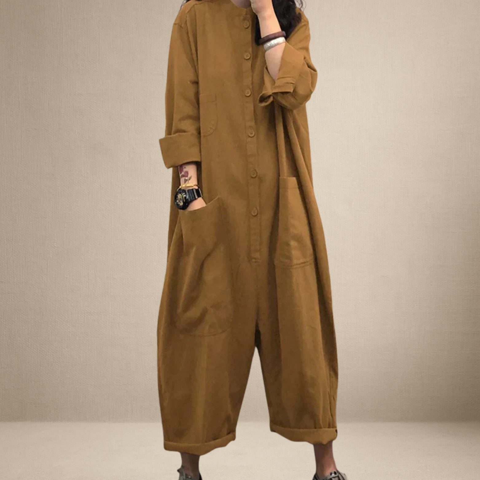 Dames jumpsuit met lange mouwen en knoopsluiting