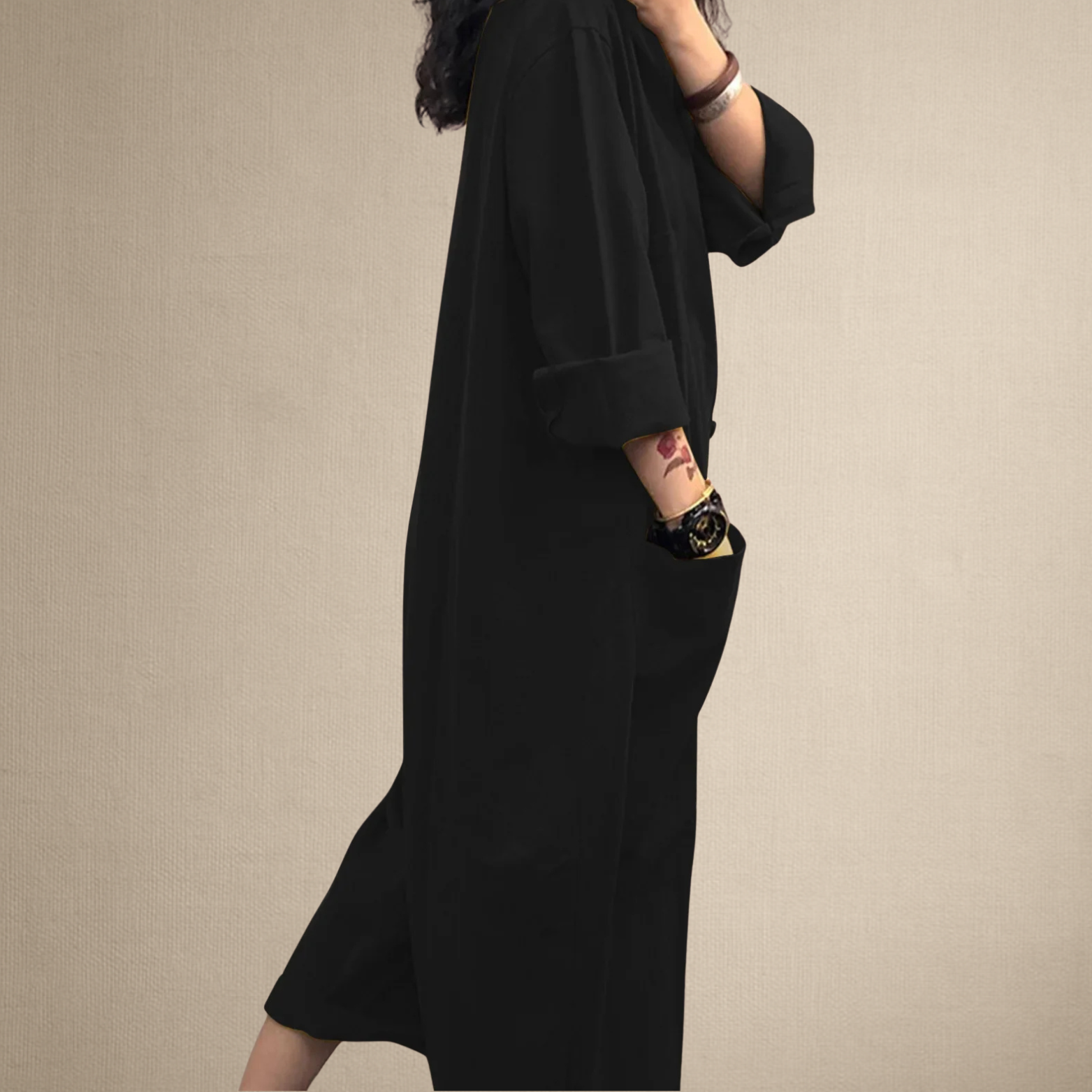 Dames jumpsuit met lange mouwen en knoopsluiting