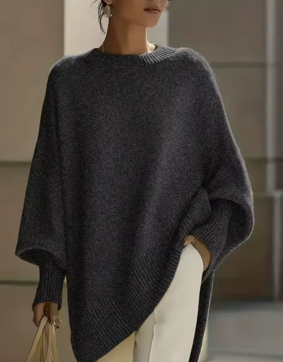 Dames Oversized Gebreide Trui met Asymmetrische Zoom en Ronde Hals