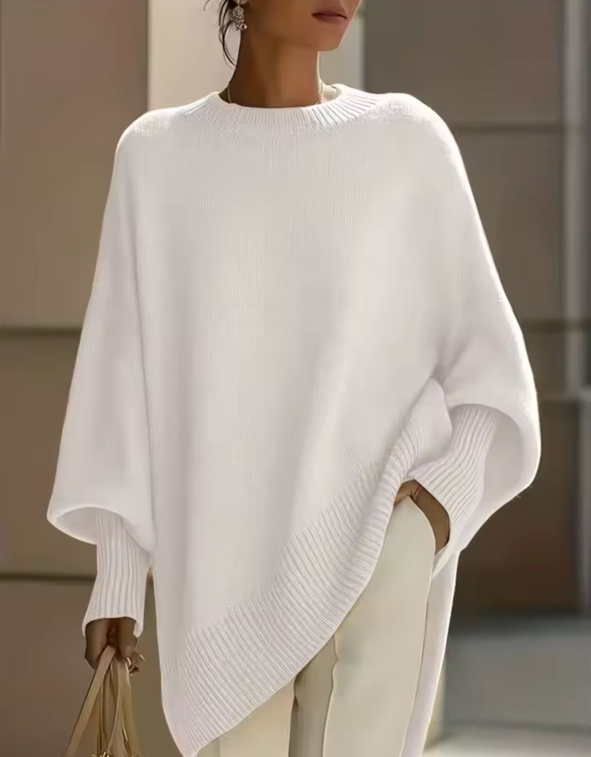 Dames Oversized Gebreide Trui met Asymmetrische Zoom en Ronde Hals