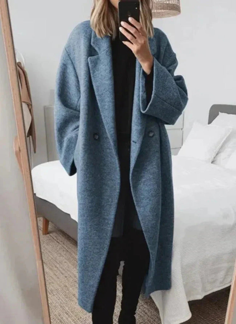 Oversized lange damesmantel met reverskraag en knoopsluiting