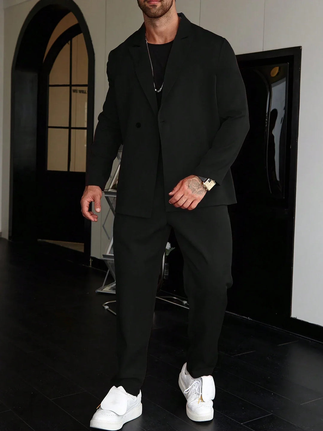Tweedelig slim fit herenpak met peak lapel en pantalon